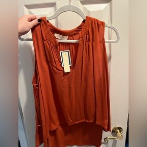 Orange blouse top